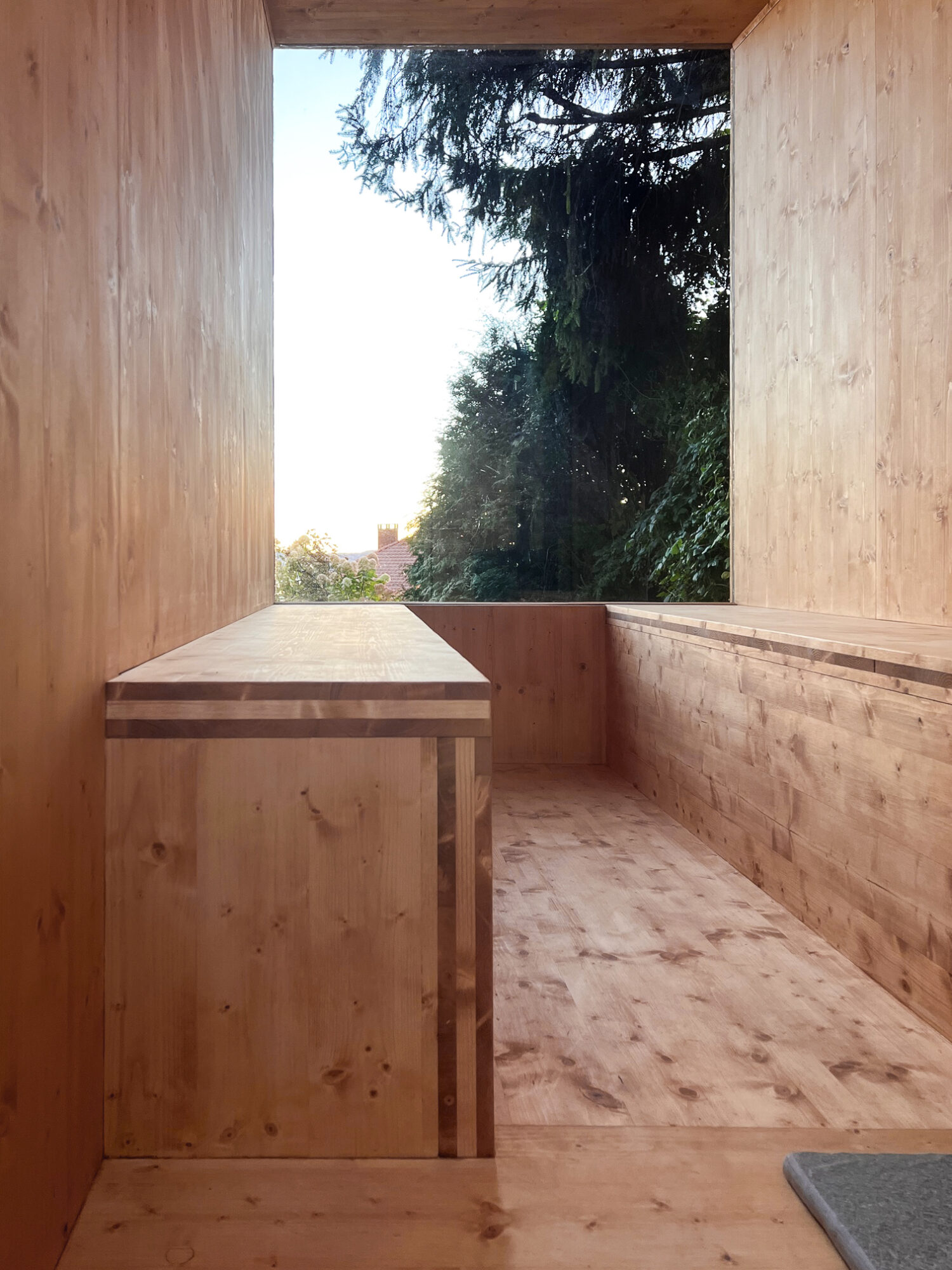 Interior picture showing CLT interior of sauna